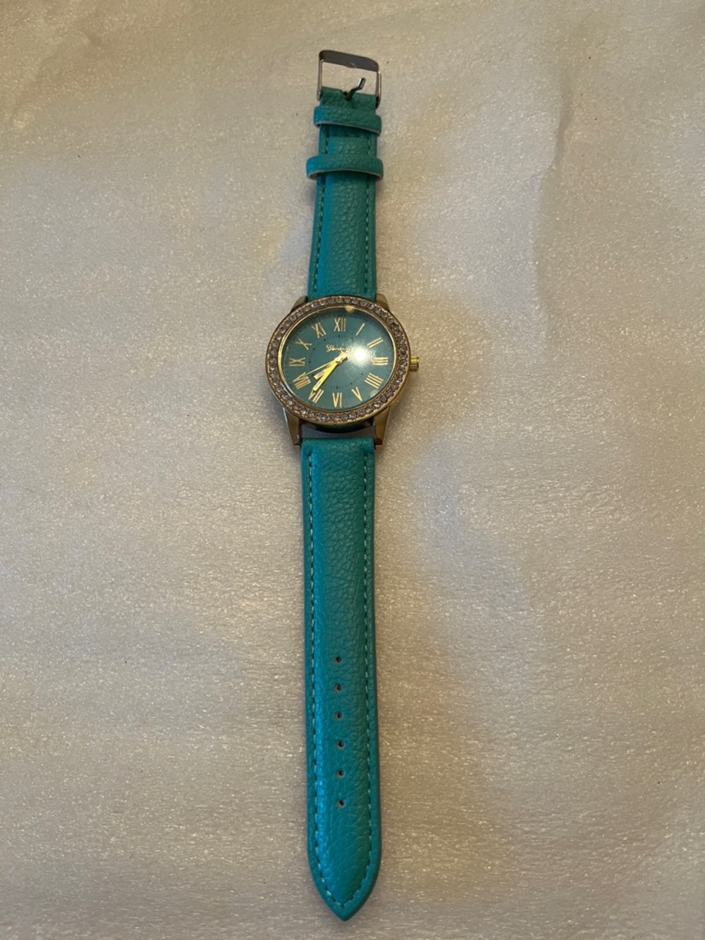 Turquoise Geneva Strap Watch with Crystal Bezel